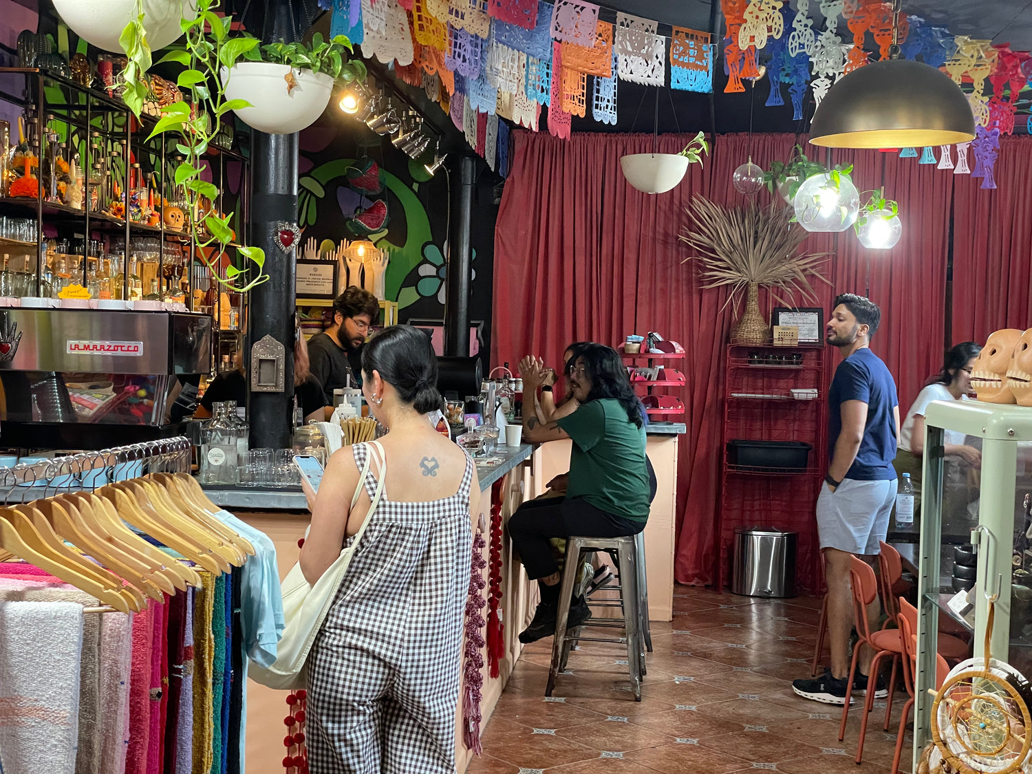 Coffee gathering at Tiendita Cafe under El Ponce